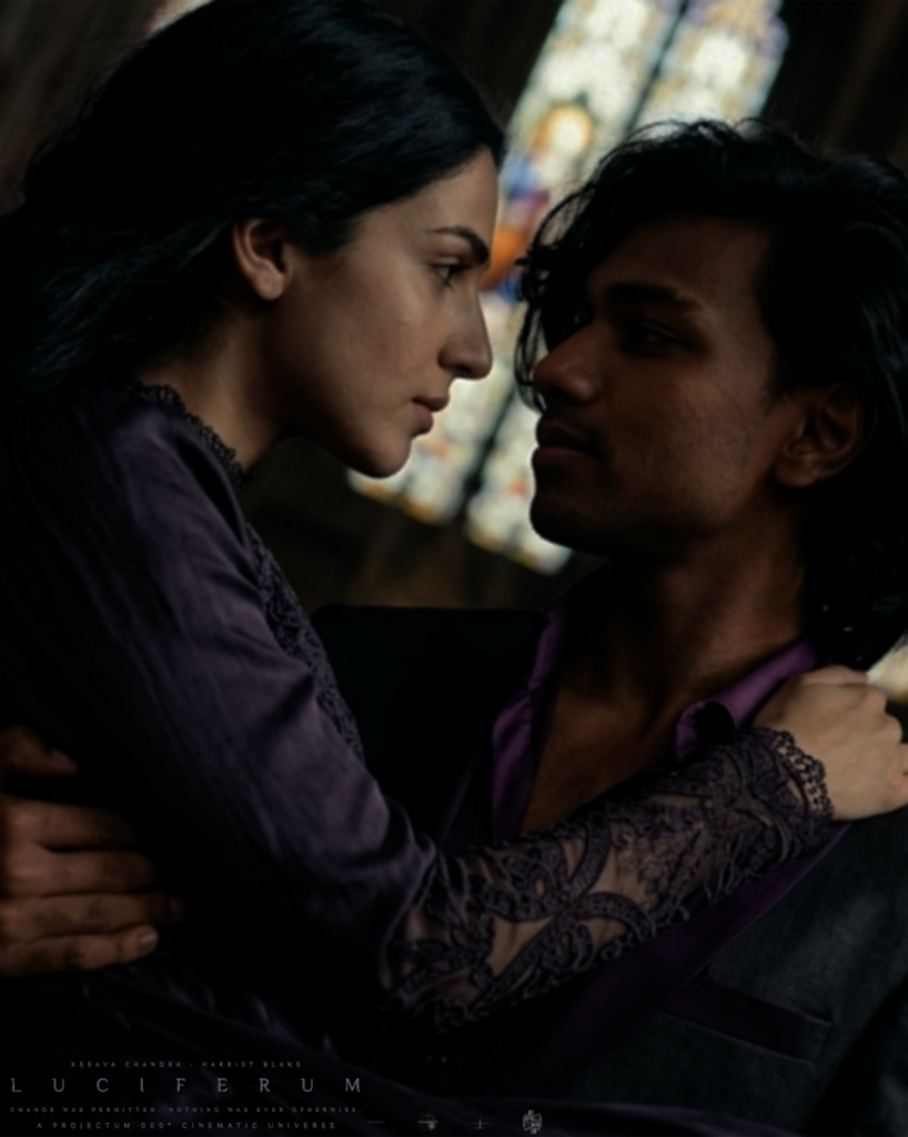 LUCIFERUM 14th Look featuring actor Kesava Chandra as The Raconteur carrying actress Harriet Blake as Valerina inside a cathedral, part of the PROJECTUM 000° Cinematic Universe.